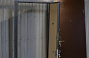 В помещение дверь из стали с отделкой ламинат Подольск