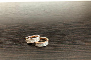 Золотые сережки с бриллиантами и золотое кольцо с Домодедово