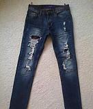 Узкие рваные джинсы 28-го размера. Качество Братск