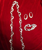 Серебряные ожерелье, серьги и браслет Kenzo Москва