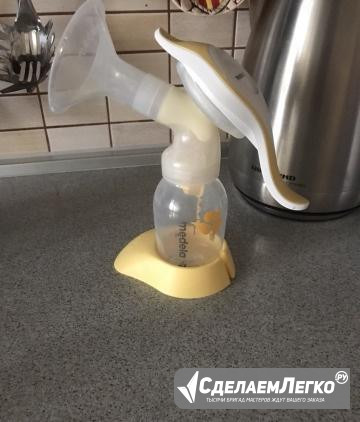 Молокоотсос ручной Medela Москва - изображение 1