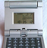 Настольные часы- калькулятор 