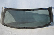 Мазда демио 2003 г стекло зад,крышки багажника Троицк