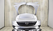 Opel Corsa E бампер капот фары крылья Москва